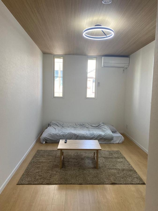 Guest House Daruma Anan Bagian luar foto